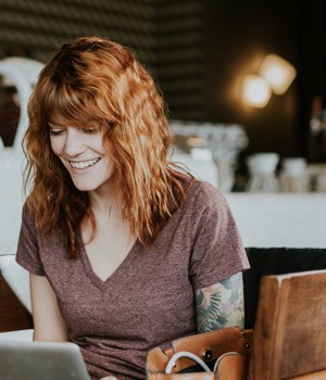 Woman Using Laptop In Coffe Lounge Whwybmtn3 0 Unsplash